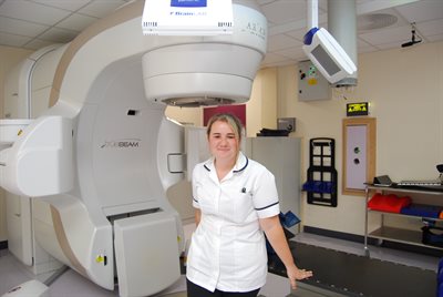 MR1424 Victoria Summers with radiotherapy machine NGH